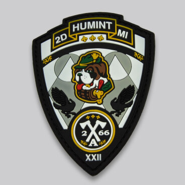 Custom military patch with a dog, black birds, and crossed axes emblems.