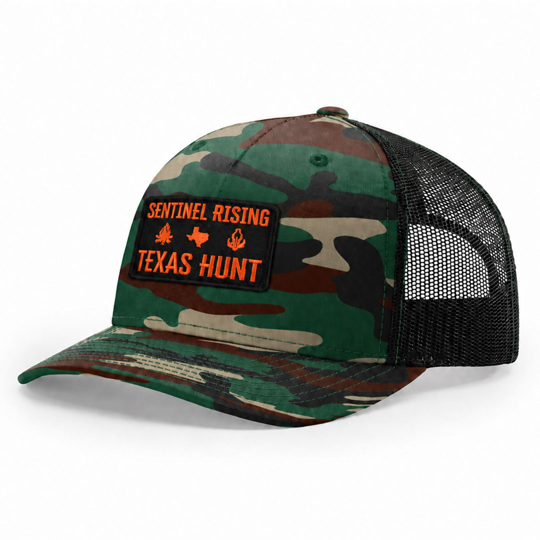 Green camo Richardson 112PFP printed trucker cap with a rectangular embroidered Sentinel Rising Texas Hunt patch on the front.