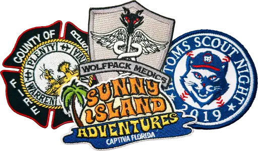 Custom embroidered patches, including a fire department crest, a Wolfpack Medics shield, a Sunny Island Adventures patch, and a Toms Scout Night patch.